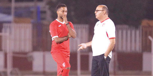  المدرب بلقاسم مع الإرتيري أحمد عبده