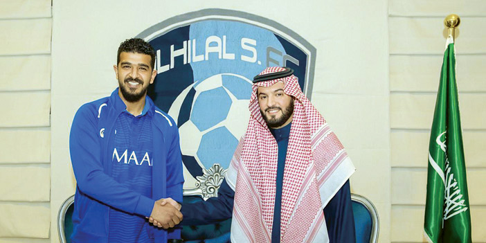  المعيوف ورئيس الهلال بعد توقيع العقد الجديد